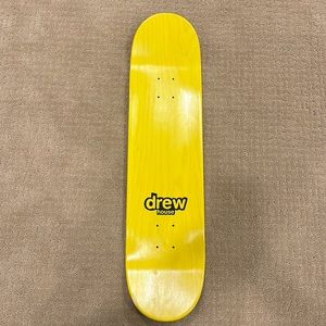 Drew house yellow skateboard
